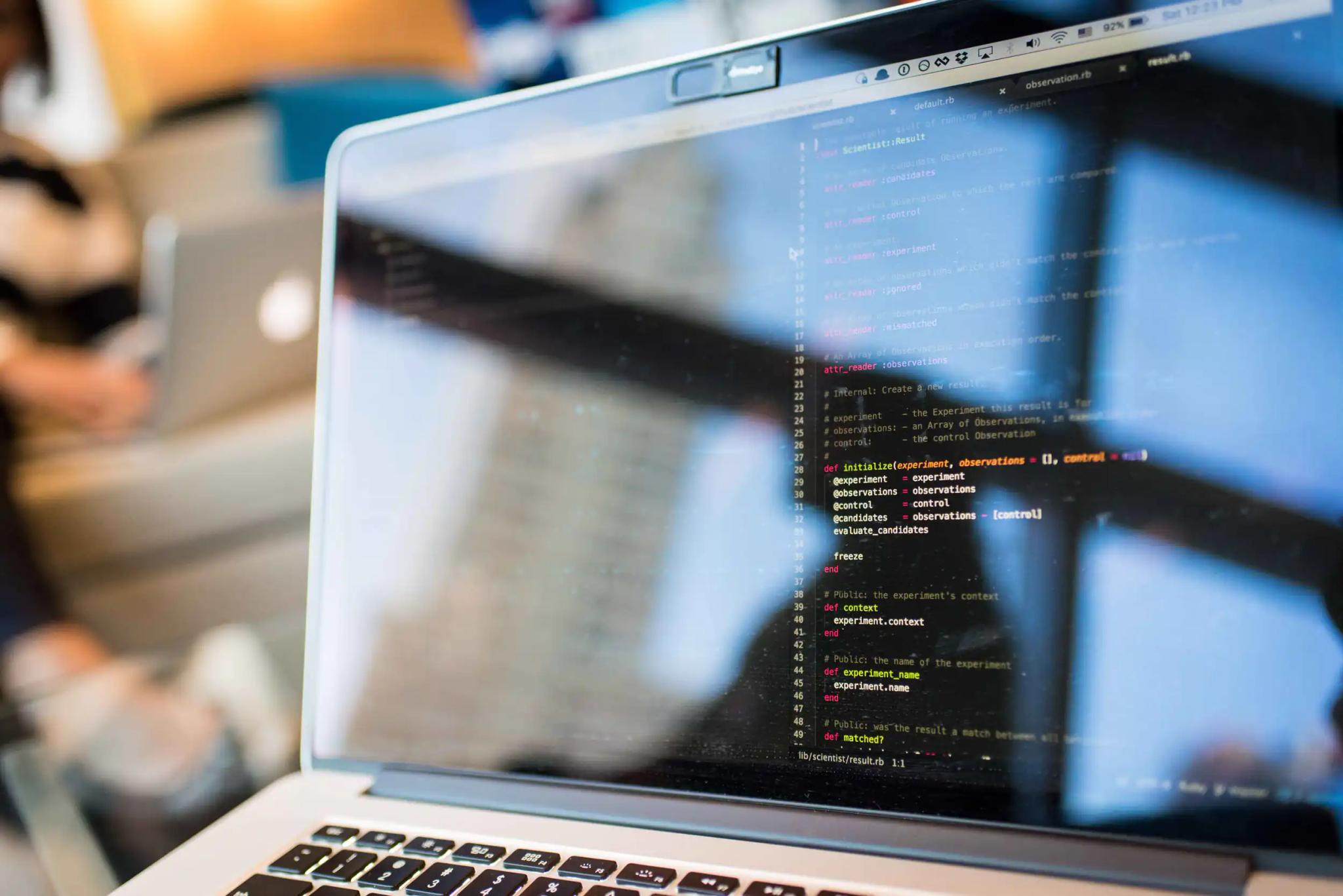 Laptop screen displaying programming code