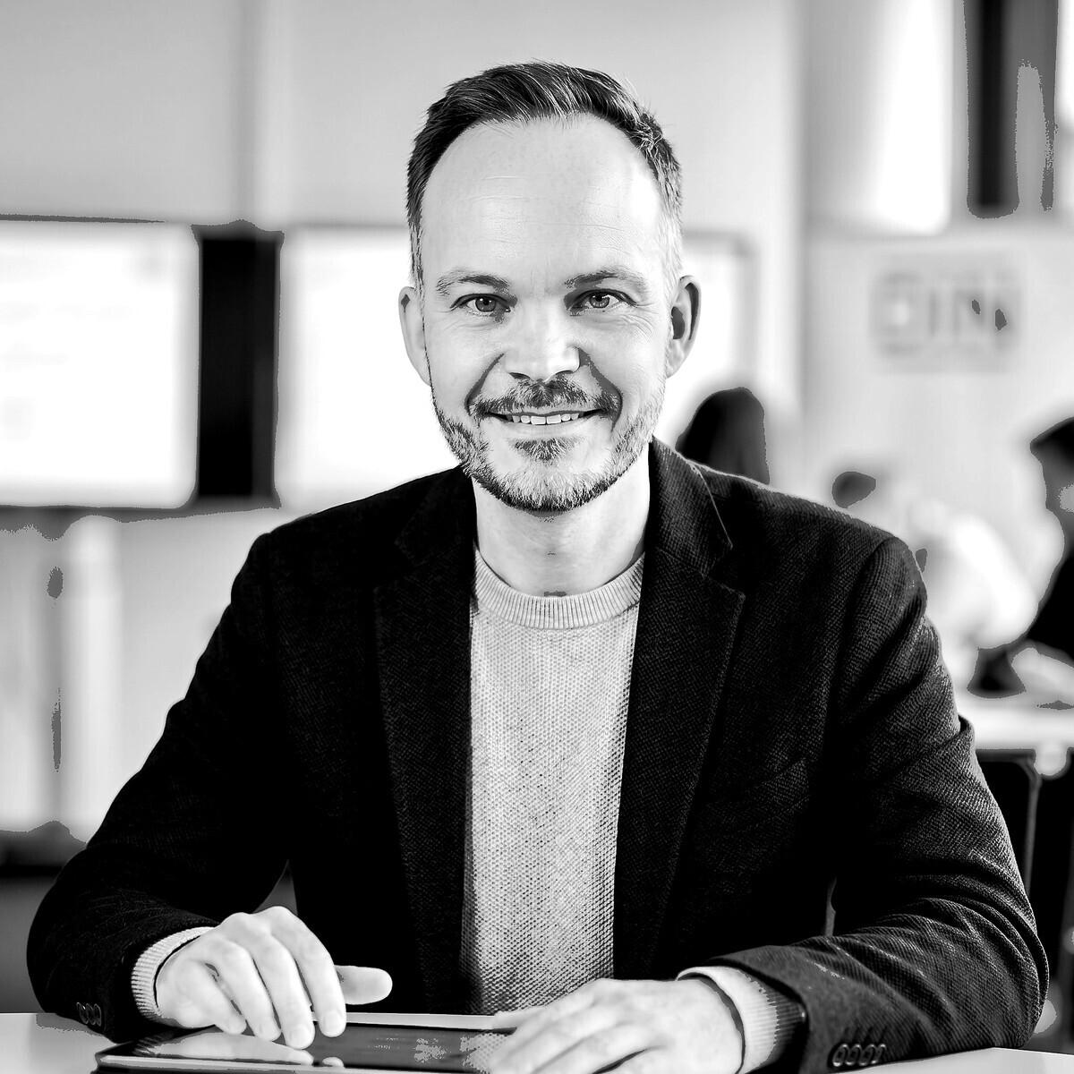 Portrait of a smiling man in an office