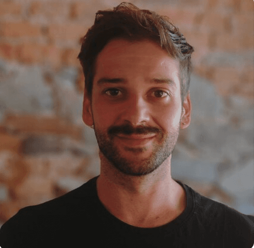 Portrait of a smiling man against a blurred background