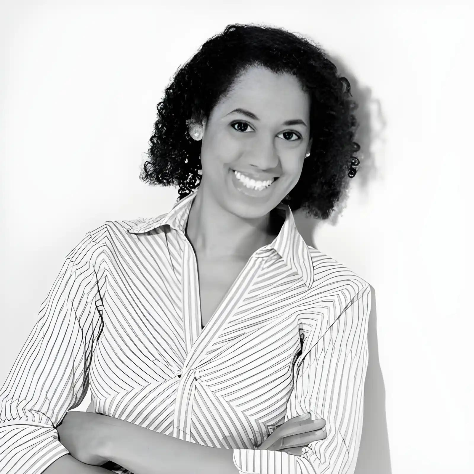 Portrait of a smiling woman with crossed arms